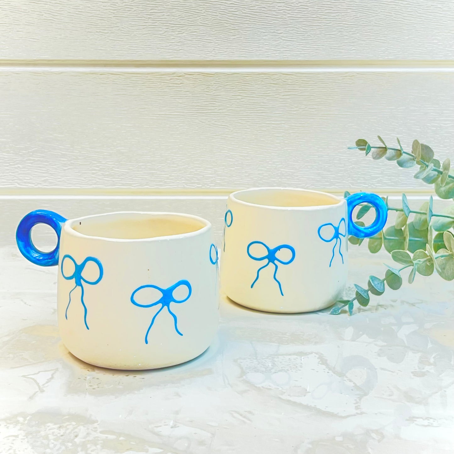 Ceramic Embossed Bow Mug Blie